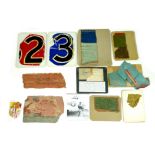 A selection of fragments from canvas aircraft, from both WWI and WWII. (1 box) Provenance - From the