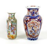 A Canton porcelain vase, Qing Dynasty, late 19th century, typically decorated with reserves of