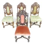 A set of four 17th century oak dining chairs, with barley twist support and carved frame,