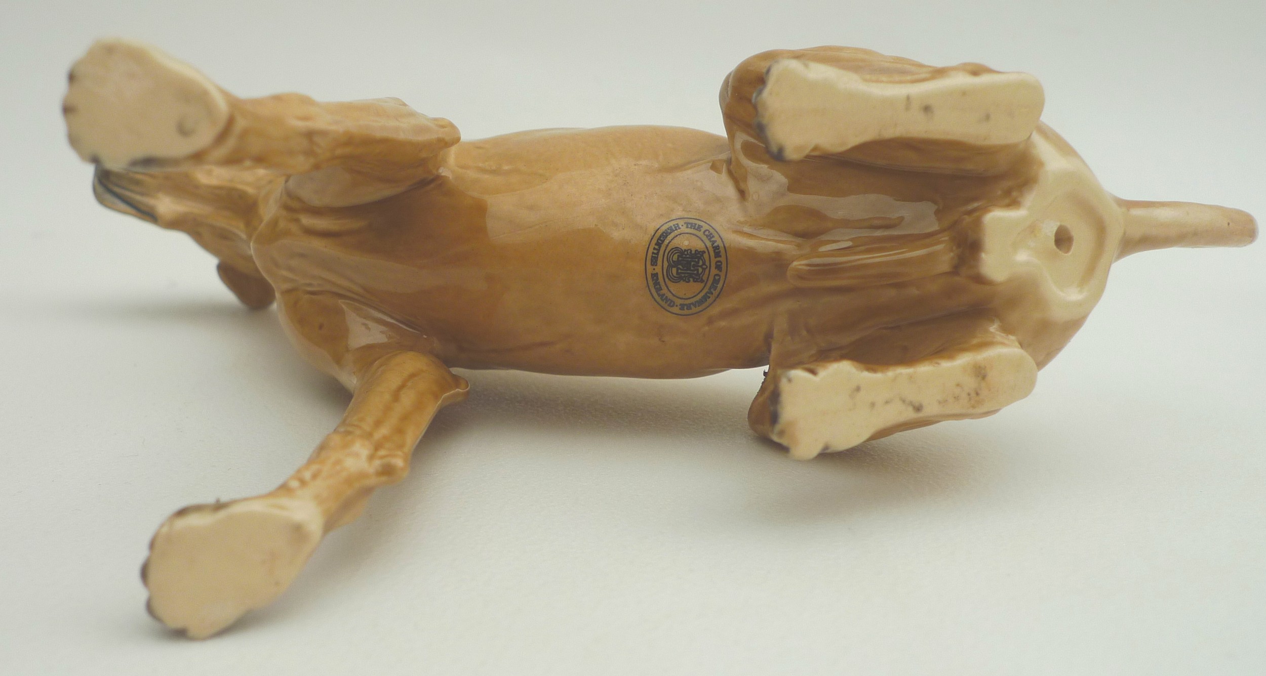 A collection of ceramic animal figurines, all modelled as dogs, some marked, including two Goebel, - Image 6 of 11