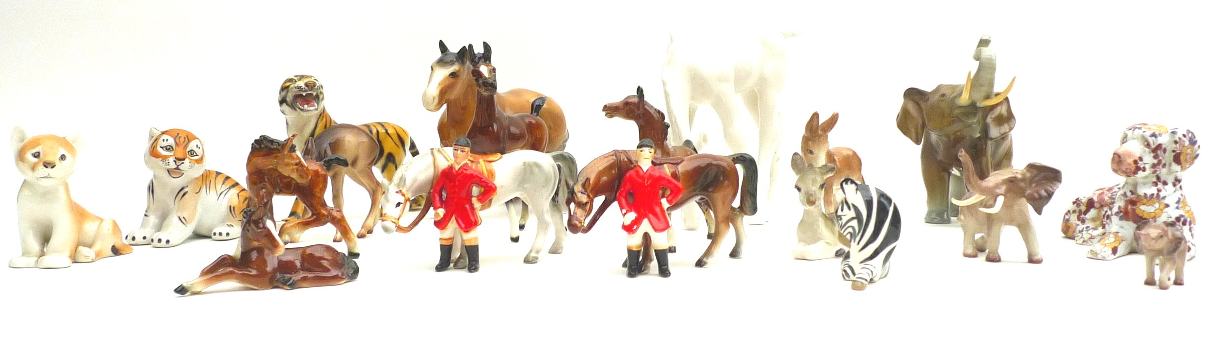 A collection of ceramic animal figurines, mostly German, including a Royal Dux elephant, 22cm by