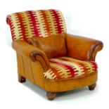 A modern brown leather armchair, with orange & red striped fabric seat and back, with small brown
