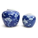 Two Chinese blue and white ceramic ginger jars, each decorated in underglaze blue with cherry