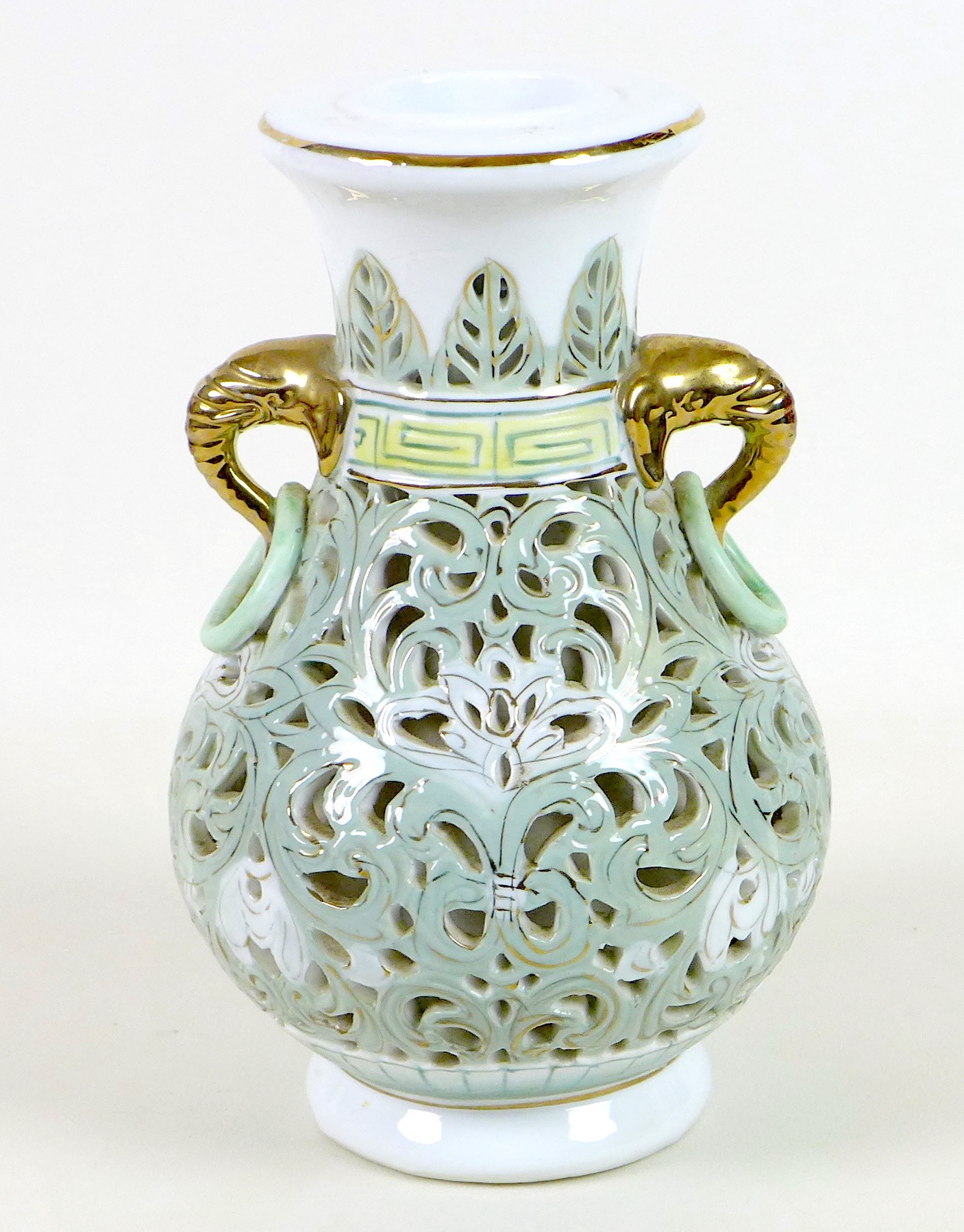 A modern Chinese porcelain reticulated vase, of baluster form with gilt highlighted elephant head - Image 2 of 9