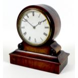 A small Victorian mahogany mantel clock, with a barrel dial on rectangular base, 8 day movement