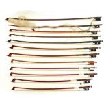 A group of twelve violin and cello bows, mostly full size including a P & H, London bow, and a