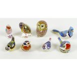 A group of eight Royal Crown Derby paperweights, all modelled as birds, all without boxes,