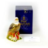 A Royal Crown Derby paperweight, Harrods limited edition, modelled as a bald eagle, numbered 102