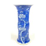 A Chinese porcelain 'Gu' shaped vase, early 20th century, decorated in underglaze blue with prunus