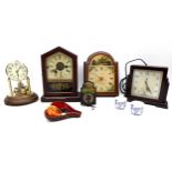A group of small mantel clocks, largest 24cm high by 18cm wide, together with a pair of willow