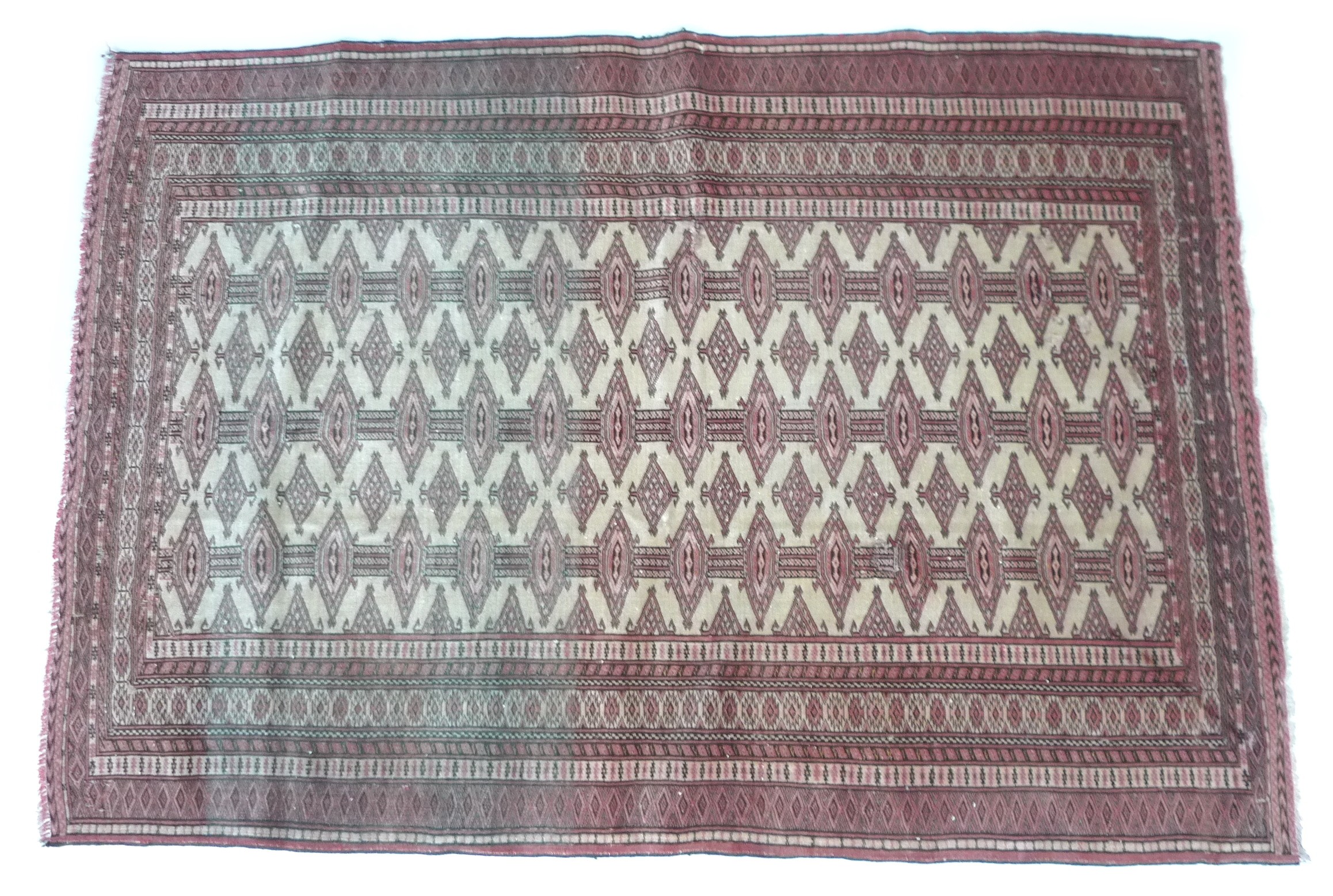 A Turkman rug with red ground and repeating central pattern, 165 by 118cm.