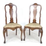 A pair of mid 19th century Dutch marquetry chairs, with high backs, vase splats inlaid with birds