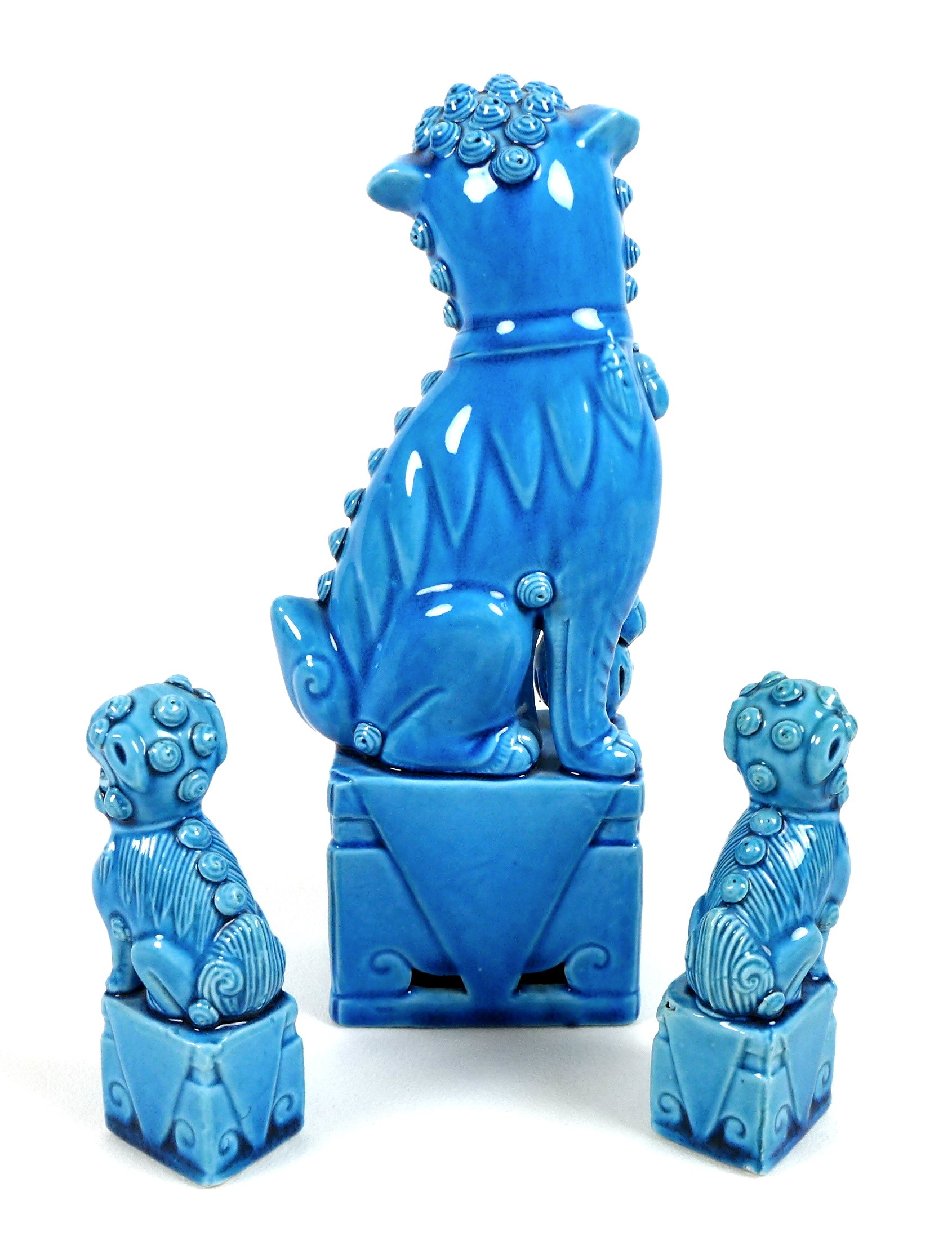 A modern Chinese turquoise glazed figure of a Buddhistic lion dog, modelled seated with left forepaw - Image 2 of 2