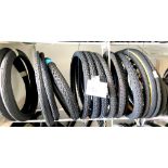 A group of new bicycle tyres, including Schwalbe and Duro. (Middle rack only)