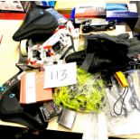 A quantity of boxed / original packaging bike parts including a RipMax Micro DV camera, MF3 saddle