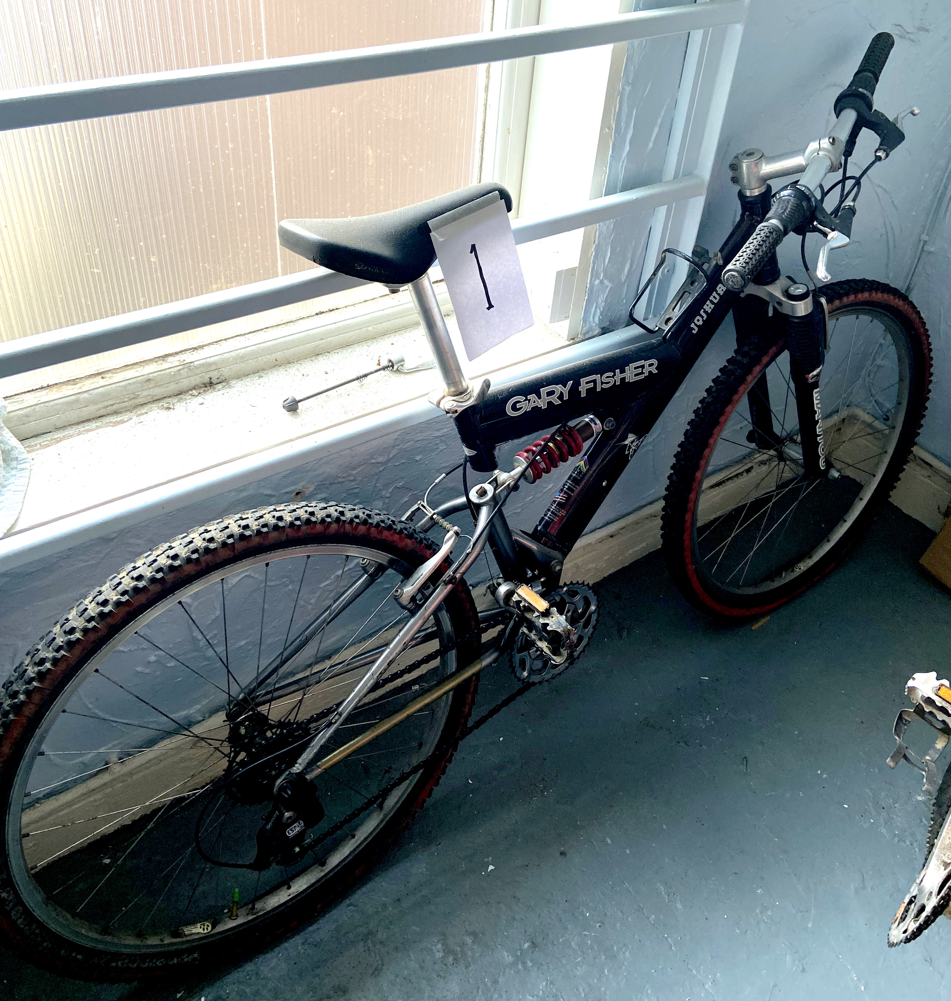 A Gary Fisher, Joshua, black painted gent's mountain bike, with dual suspension.