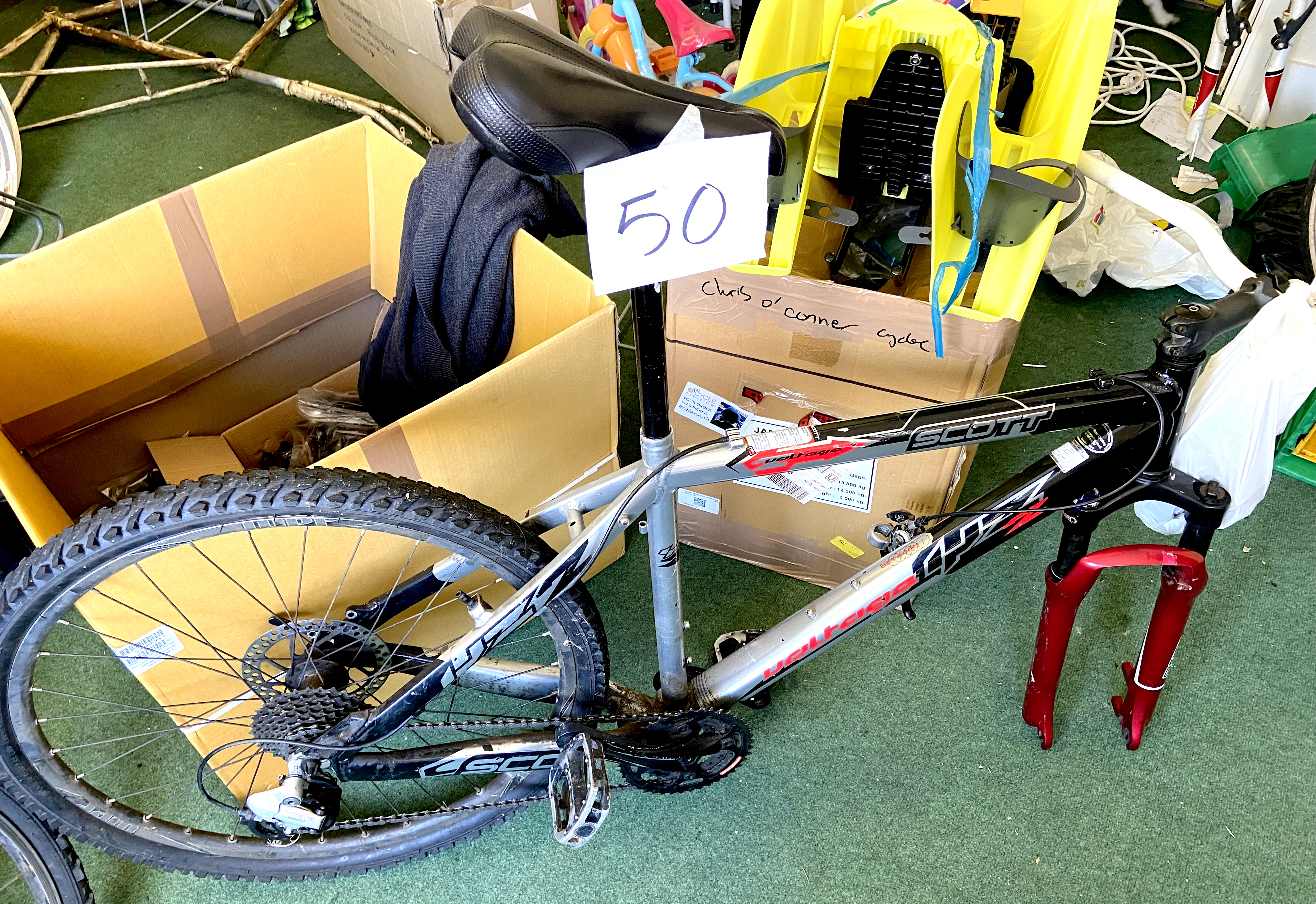 A Scott Voltage YZ2 silver, black and red painted gent's mountain bike, with dual suspension,