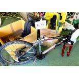 A Scott Voltage YZ2 silver, black and red painted gent's mountain bike, with dual suspension,