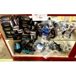 The contents of shop cabinet (LHS), including boxed valves, tubes, steel toe clips, and