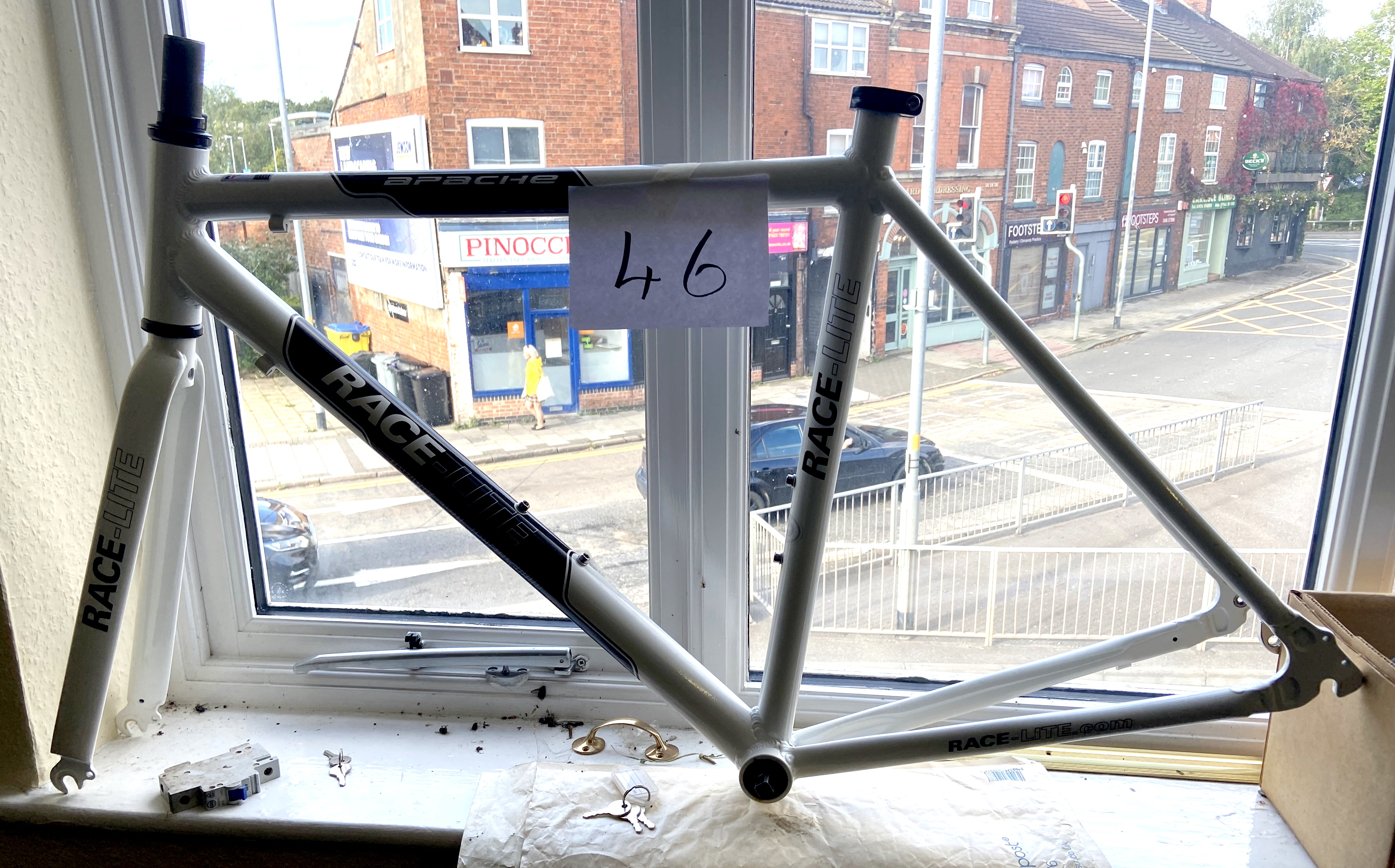 An Apache Race-Lite white and black painted bike frame only.