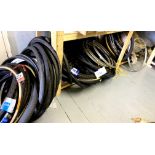 A quantity of bike tyres and wheel rims. (Floor below racking only)