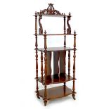 A French late 19th century whatnot, with pierced and carved crest, five serpentine shaped shelves,