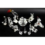A group of nine Swarovski crystal ornaments, comprising a Toucan 7621 NR000 006, Mother goose 7613