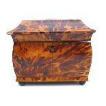 A Georgian tortoiseshell twin division tea caddy, 18 by 10.7 by 14.8cm high.