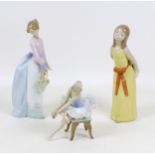 Three Lladro figurines, comprising 'Opening night' 5498, 'Basket of Love' 7622, 'Naughty girl with