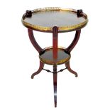 An Edwardian mahogany occasional table, circular surface with brass gallery, lower tier shelf with
