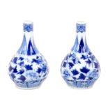 A pair of small Chinese porcelain gourd vases, late 19th century, decorated in underglaze blue