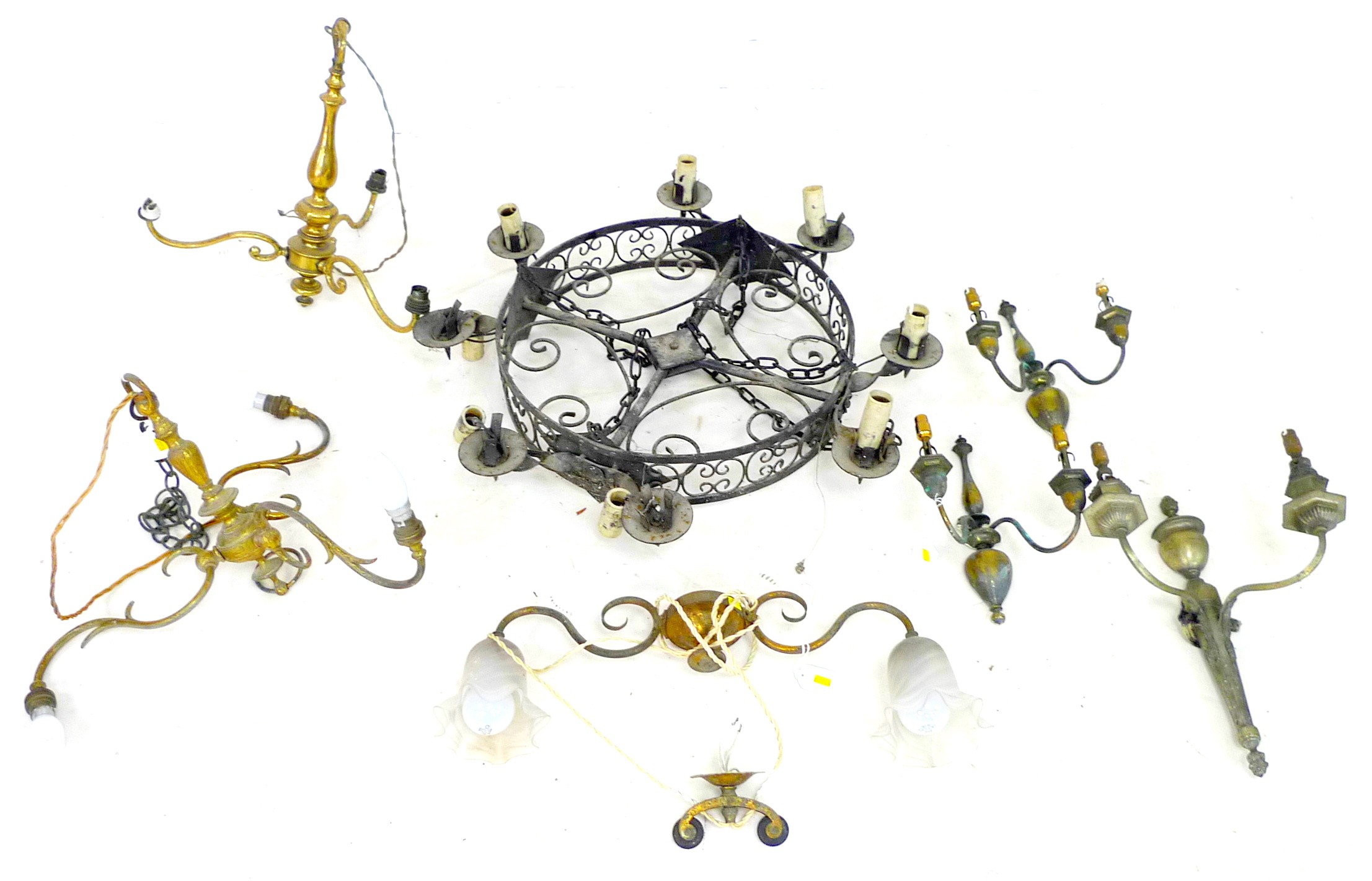 A group of vintage metal light fittings, comprising a black painted eight light chandelier, 47 by 47