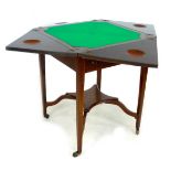 A Victorian rosewood envelope topped games table, with urn, scroll, and swag marquetry inlays, the