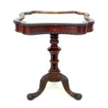 A good Victorian rosewood vitrine, the serpentine shaped glazed box top with applied bead, and