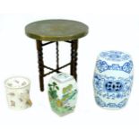 A modern Chinese porcelain garden seat, 31 by 31 by 45cm high, decorated in underglaze blue,