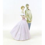 A Lladro figural group, modelled as 'An Evening Out', with impressed and number '53540' to its base,