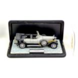 Two Franklin Mint die-cast model Rolls Royce vintage cars, comprising a 1925 Silver Ghost, with