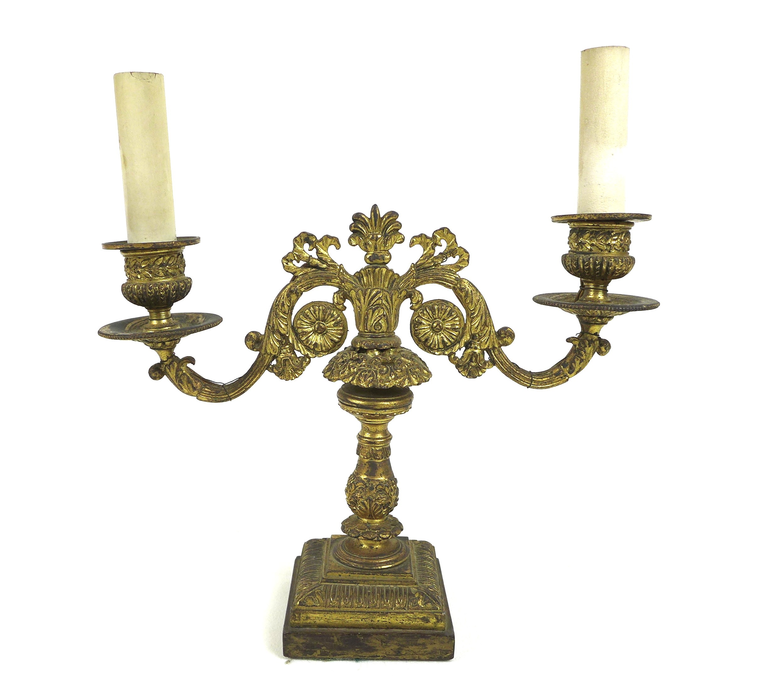 A French late 19th century gilt metal twin branch table lamp, with floral scrolling decoration and