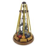 An Edwardian tabletop miniature croquet set, possibly by Jaques & Son, London, comprising a turned