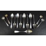 A group of Georgian silver flatware, comprising nine teaspoons, including a set of three George