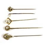 A group of gold stick pins, comprising an Art Nouveau 10ct gold, pearl and opal pin, 1.3g, an 18ct