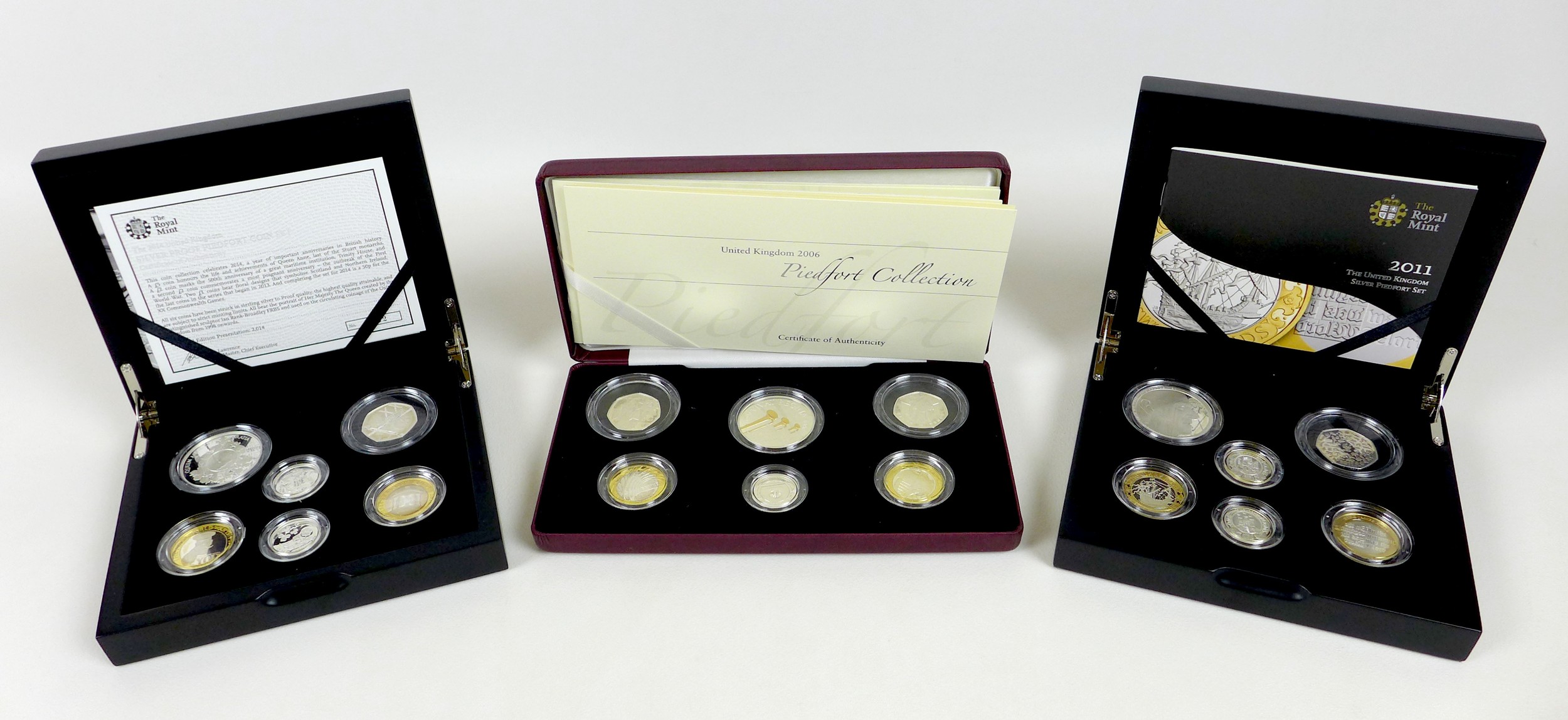 A group of three Elizabeth II Royal Mint UK Piedfort coin sets, comprising 'United Kingdom 2006
