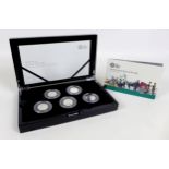 A limited edition Elizabeth II commemorative silver proof five 50p coin set, 'Celebrating 50 years