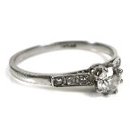 A platinum diamond and sapphire ring