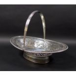 A Victorian silver swing handled fruit basket, the pierced sides decorated with friezes of leaves