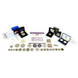 A collection of Victorian and later coins, including an 1892 Victoria one shilling piece, a