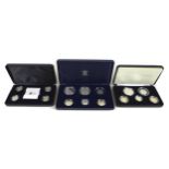 A group of three Elizabeth II Royal Mint UK proof coin sets, comprising 2007 silver coin