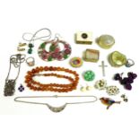 A small group of costume jewellery, including pill boxes, an amber style necklace, and various