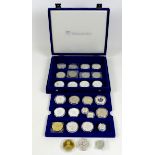 A collection of UK and Commonwealth issue silver coins, including five Britannia silver £2 coins,