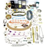 A group of costume jewellery, including a cultured pearl necklace, a thimble with enamel decoration,